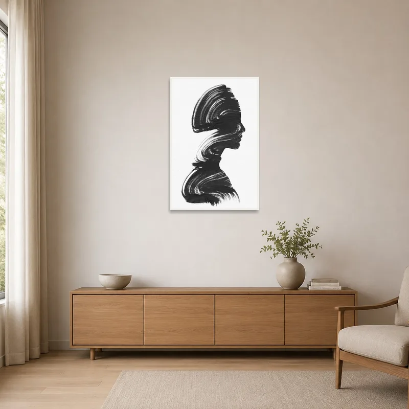 Minimalist room featuring an elegant silhouette brushstroke art print.