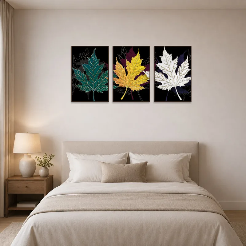 Colorful leaf triptych bringing serene warmth to a bedroom.