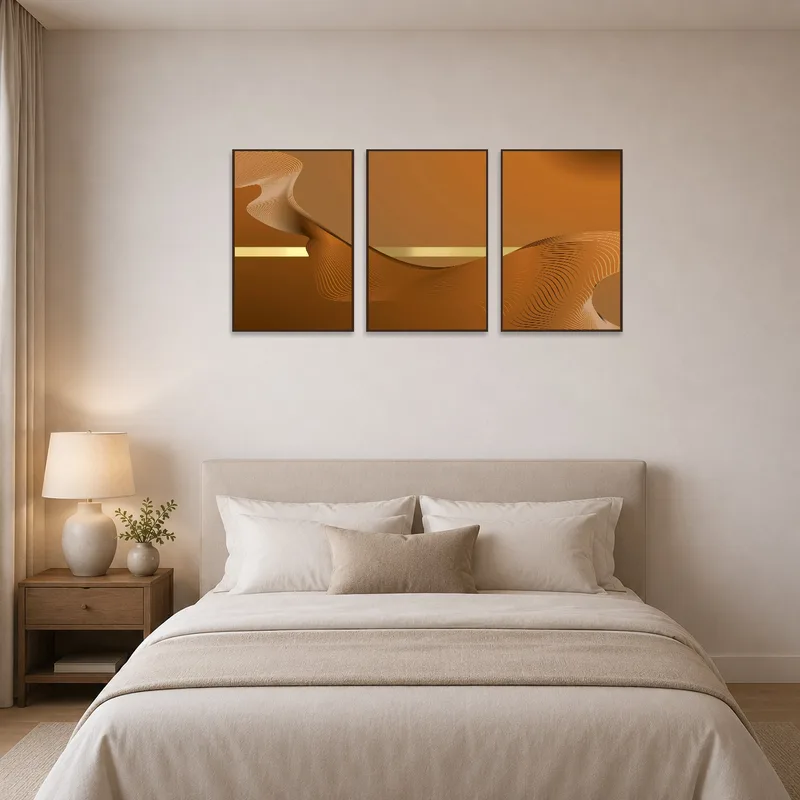 Abstract wave triptych in warm earthy colors above a bed in a cozy bedroom.