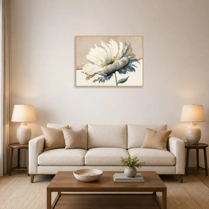 Elegant white floral art print on living room wall above a modern sofa.