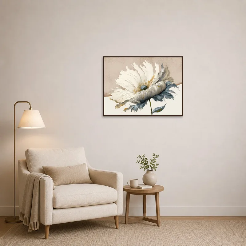 Cozy reading corner enhanced by elegant white floral art piece.