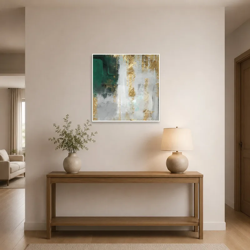 Striking emerald and gold art piece in an entrance hall with sleek decor.