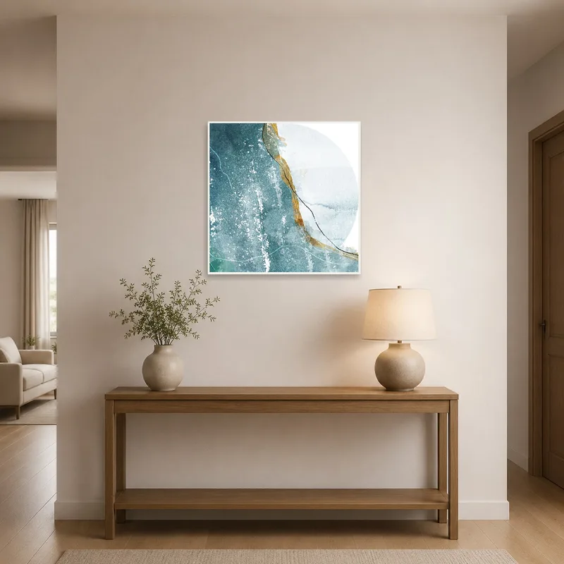 Abstract wave art in luxurious blue and gold greets visitors in the entrance hall.
