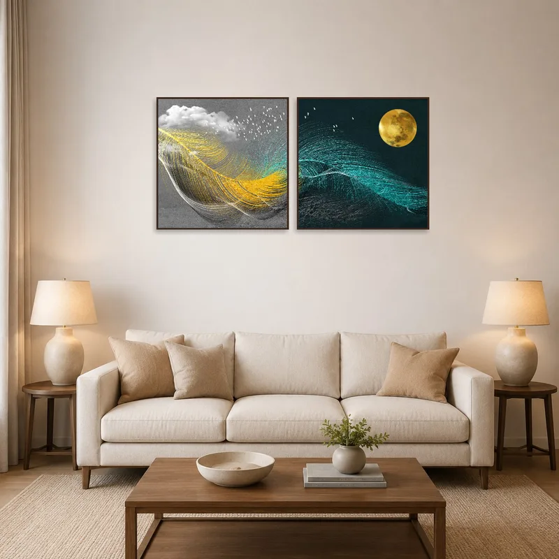 Abstract sun and moon art set adorns a sophisticated living room wall.