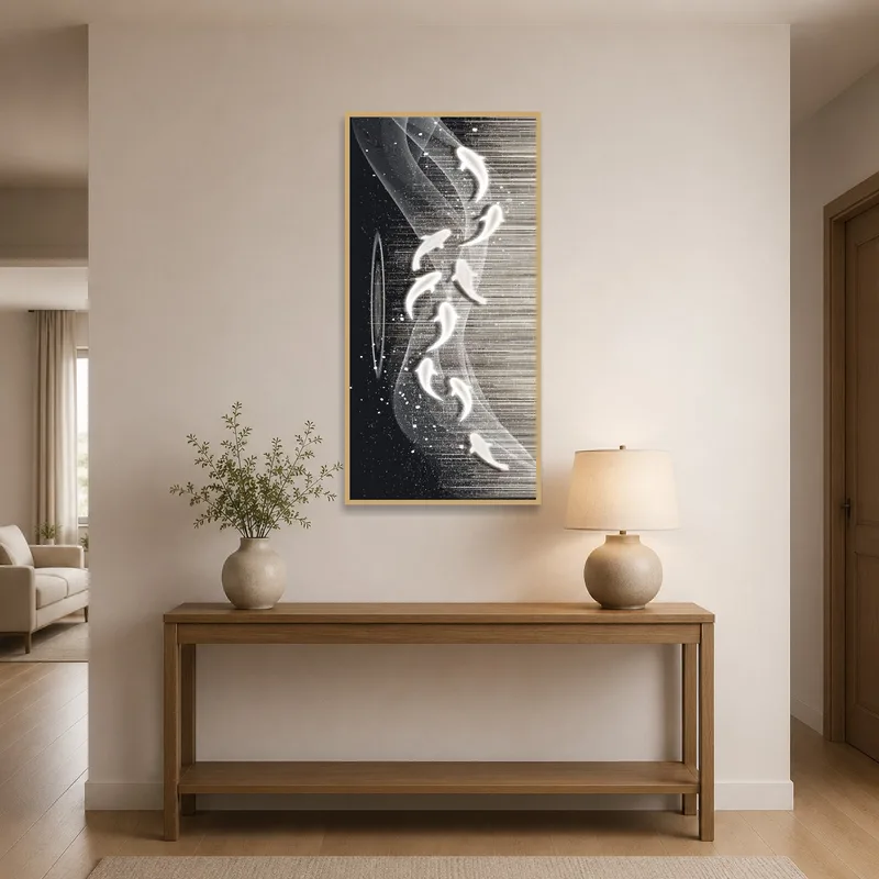 Black and white abstract art greeting guests in a chic entrance hall.