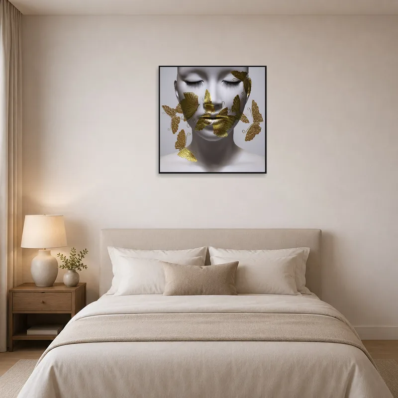 Relaxing bedroom setting with golden butterflies art hanging above the bed.