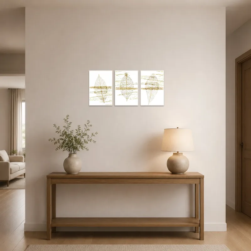 Ethereal Leaf & Gold Abstract Triptych Set displayed in a welcoming entrance hall with modern accents.