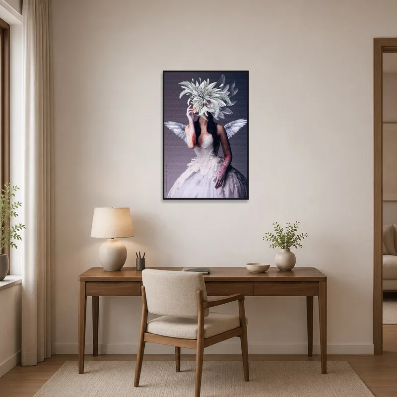 Winged figure artwork inspiring a creative home office.