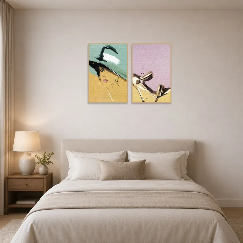 The bedroom features a fashionable art set above the bed.