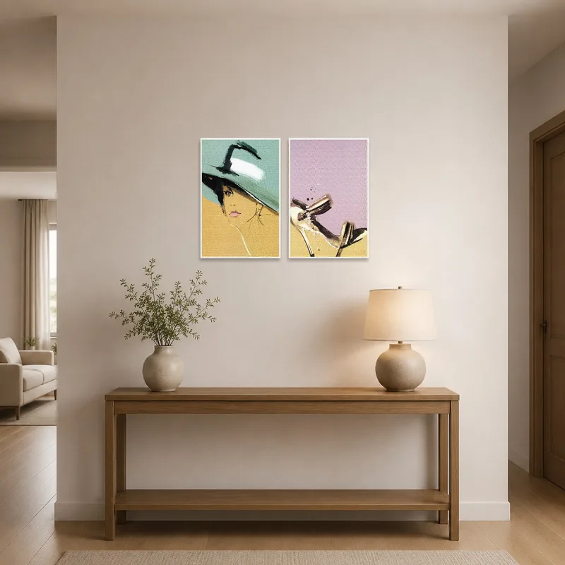 Elegant fashion artwork set welcomes guests in the entrance hall.