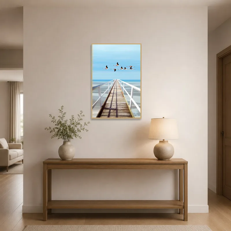Entrance hall features Flamingos over Ocean Pier by a stylish console table.