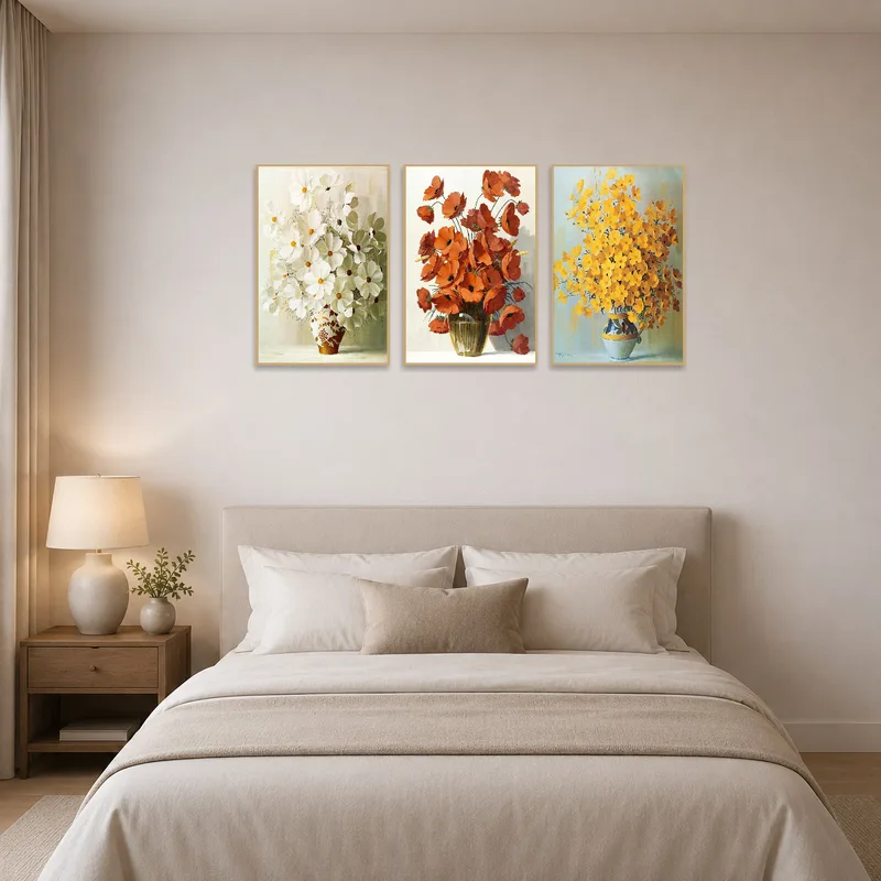 Bedroom's restful vibe complemented by a soothing botanical triptych set.