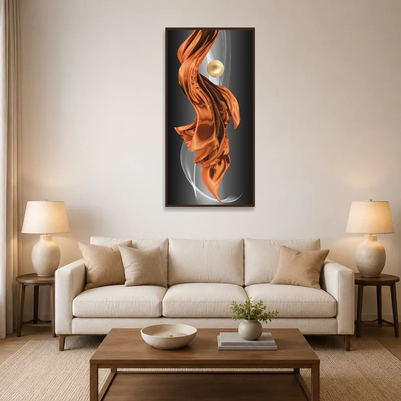 Flowing bronze drapery artwork with a golden orb on a living room wall.