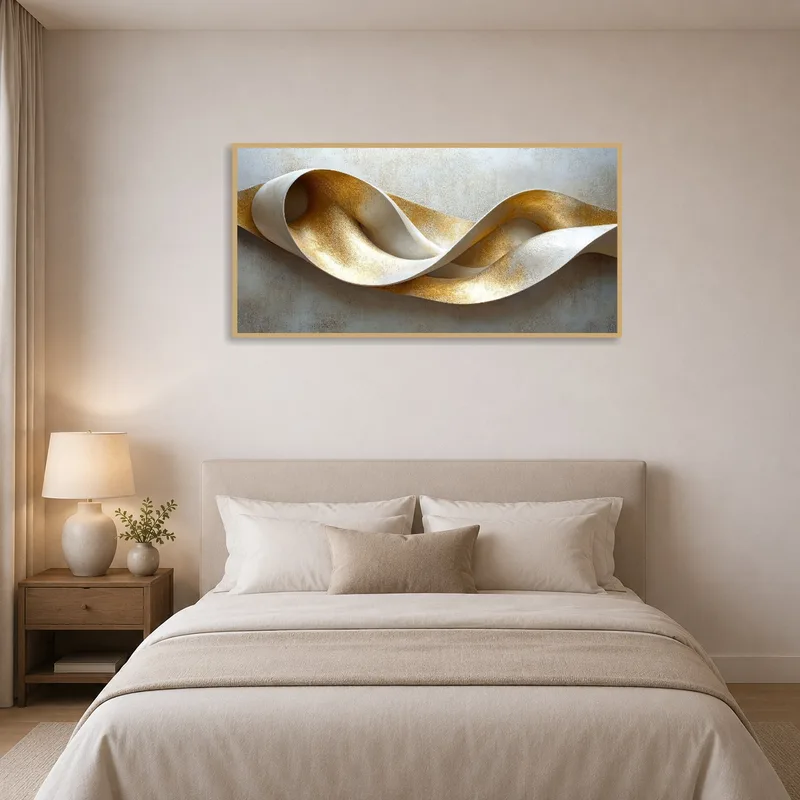 Abstract sculpture art in gold and ivory creates a tranquil atmosphere in a serene bedroom setting.