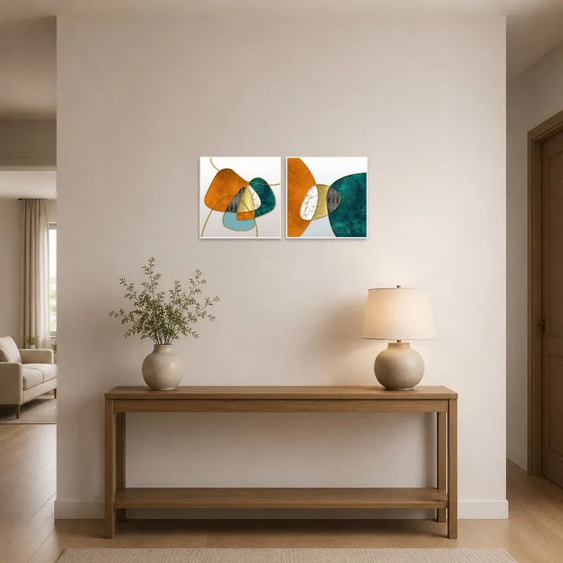 Welcoming entrance hall adorned with geometric abstracts in earthy and teal tones.