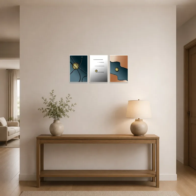 Colorful geometric abstraction triptych welcomes guests in a stylish entrance hall.