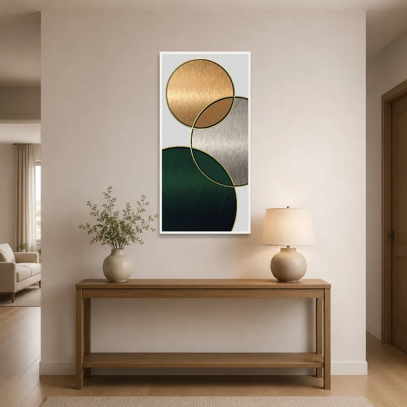 Elegant metallic circles artwork greets guests in an entrance hall.
