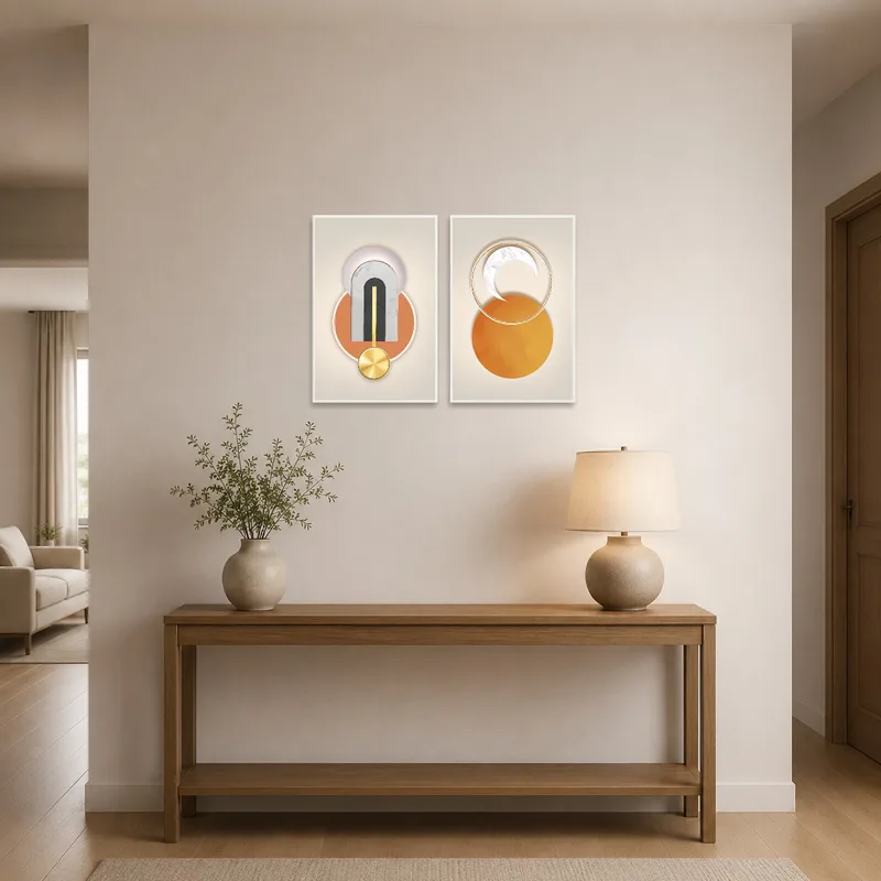 Abstract geometric art duo displayed in a stylish entrance hall.