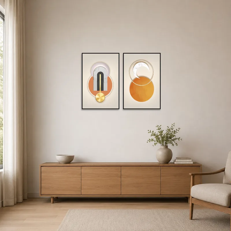 Minimalist setting with two geometric artworks hanging on a clean white wall.