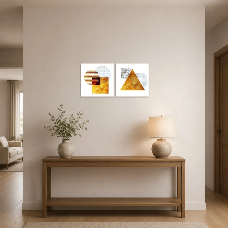 Golden geometric shapes greet guests in a stylish entrance hall.
