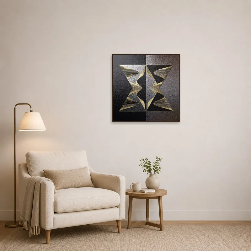Sophisticated geometric art in gold and black in a cozy reading corner.