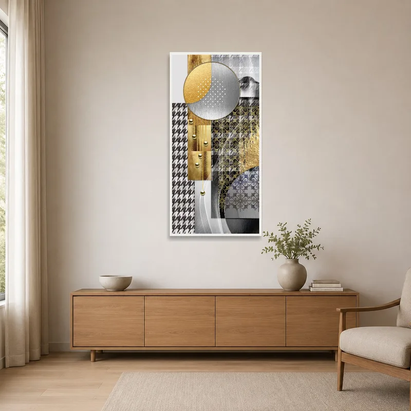 Gold and silver geometric art on a plain white wall.