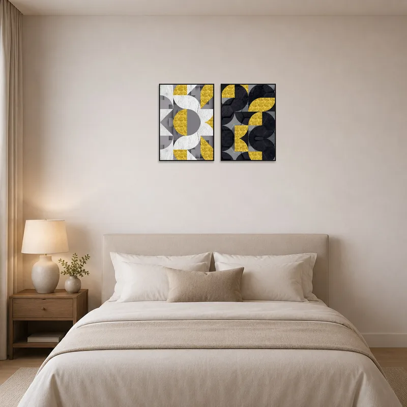 Bedroom wall adorned with a set of gold and gray geometric pieces above the headboard.
