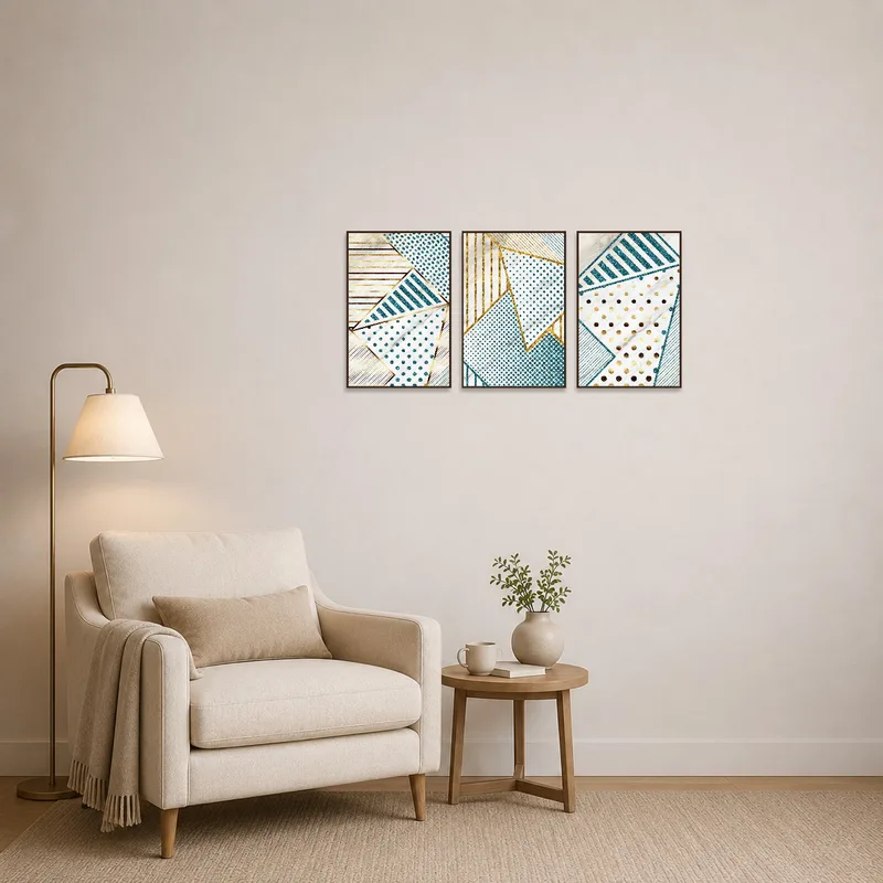 Cozy reading corner enhanced by elegant teal and gold geometric wall art.