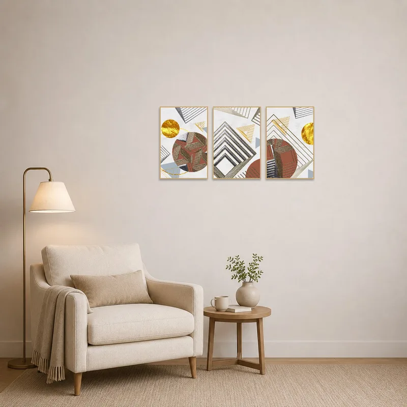 Earthy tones of the triptych set provide a calming backdrop in a cozy reading corner.