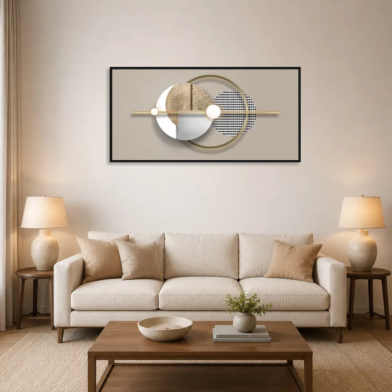 Geometric wall art with gold accents on a living room wall above a modern sofa.