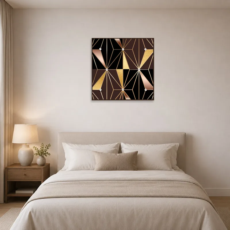 Elegant geometric artwork enhances a bedroom with luxurious tones.