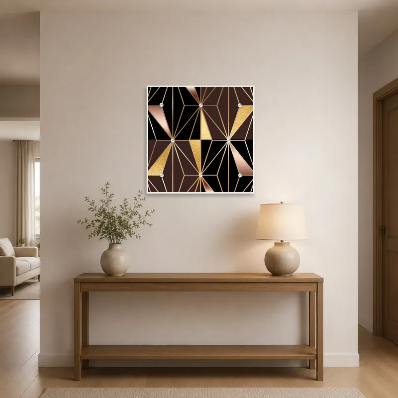 Striking geometric design in gold and black welcomes in a hallway.