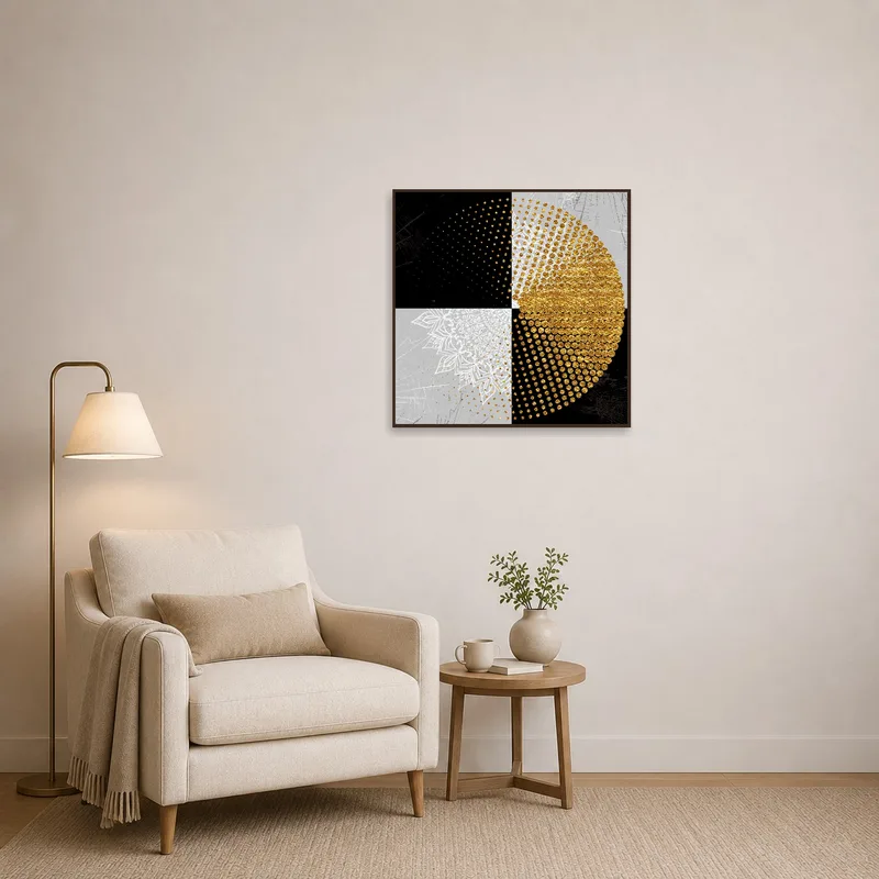 Cozy reading corner accented by a gold and black geometric circle art print.