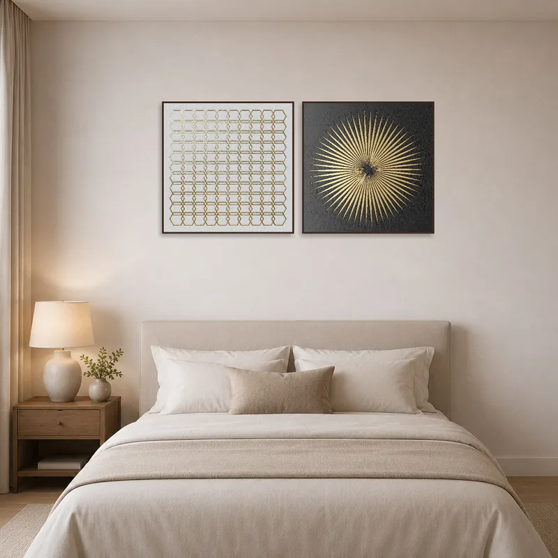 Geometric artwork set creating a calming atmosphere in a serene bedroom.