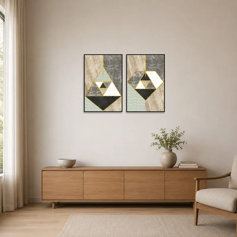 Minimalist room with geometric marble and gold art set on a plain wall.