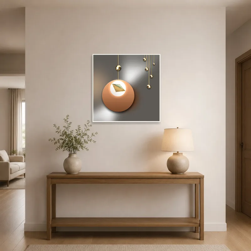 Striking geometric metallic art piece welcomes guests in a stylish entrance hall.