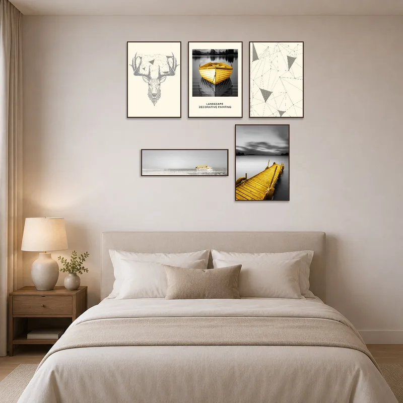 Geometric nature and nautical yellow art set hanging above a bed with soft linens.