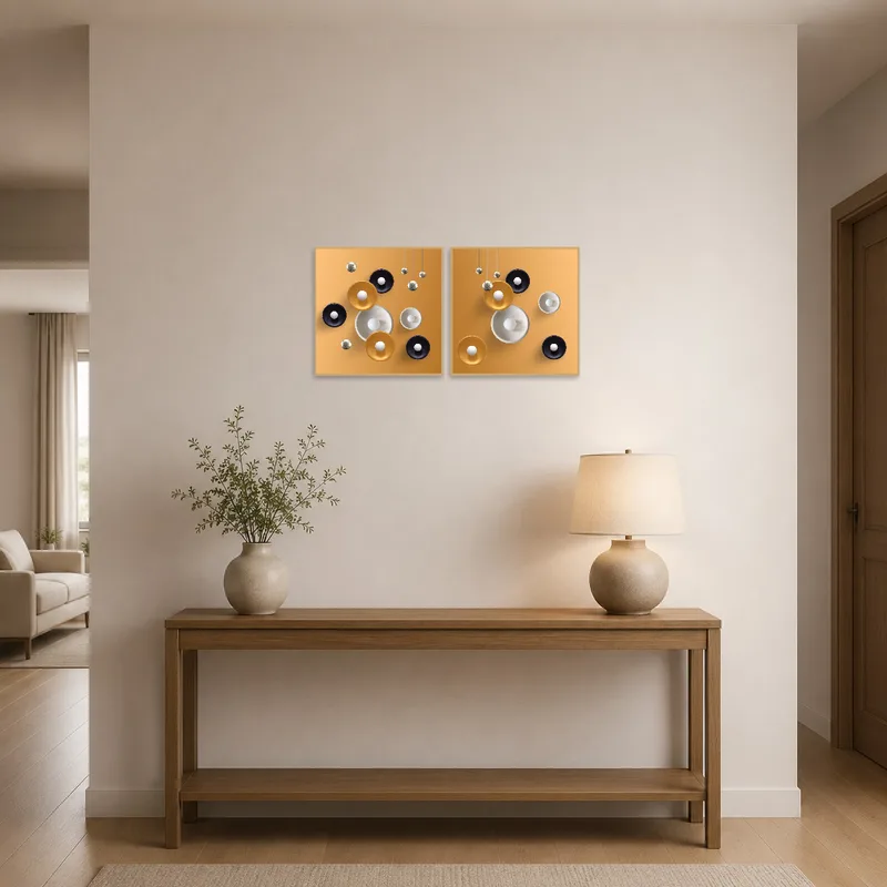 Geometric orb set with metallic accents welcoming guests in the hall.