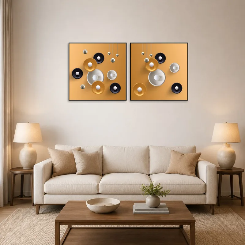 Geometric orb art set with metallic accents hanging above a modern sofa.