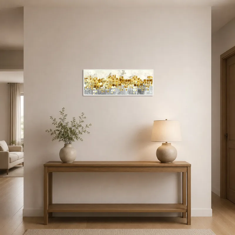 Gold abstract art enhancing the entrance hall's ambiance.