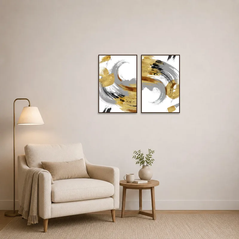 Gold and gray brushstrokes provide a sophisticated touch in a reading corner with a comfy chair.