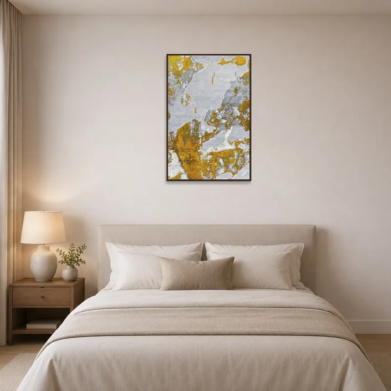 Soft gold and gray hues create a serene atmosphere in the bedroom.
