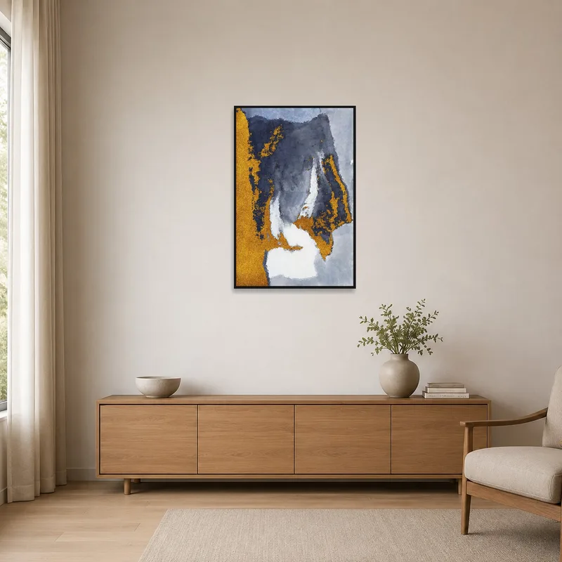 Gold and gray abstract piece in a minimalist room with clean lines.