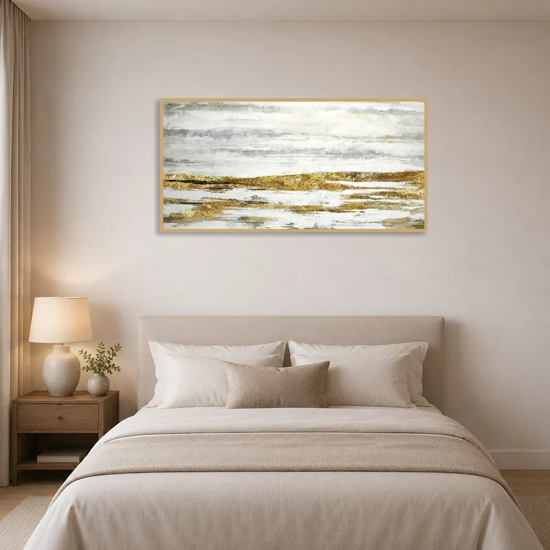 Bedroom with calming gold and gray abstract landscape art on the wall.