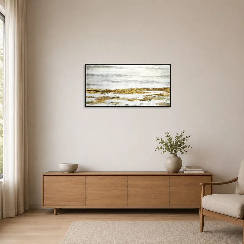 Minimalist room with gold and gray abstract landscape art as a focal point.