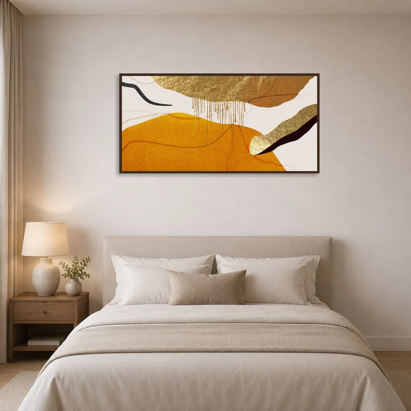 Warm abstract artwork complementing a serene bedroom.