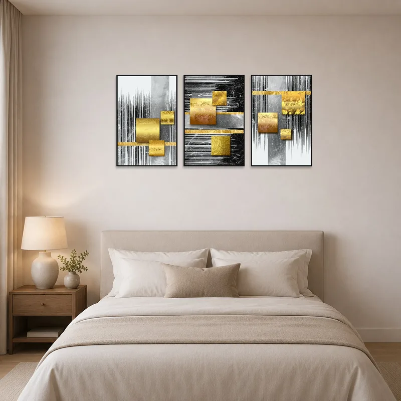 Elegant geometric triptych adds a metallic touch above the bed.