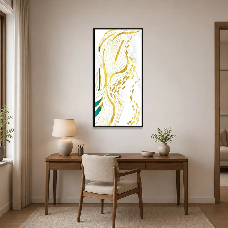 Fish art print with fluid lines in gold and teal on a home office wall near a desk.