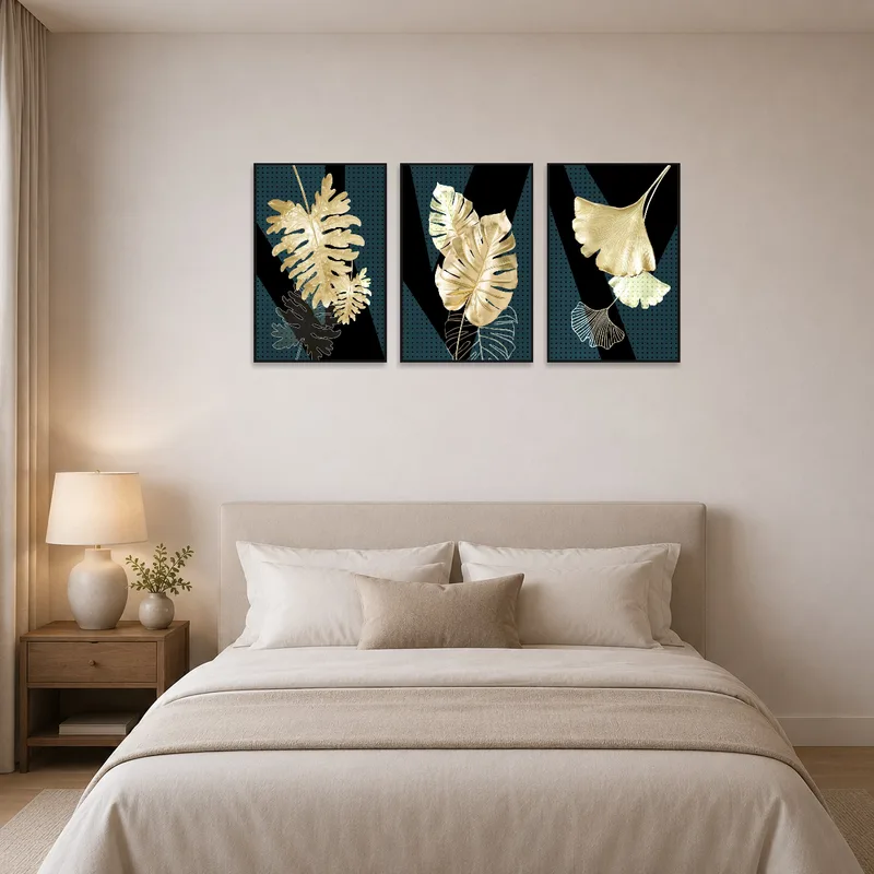Tranquil bedroom features gold geometric leaf triptych on the wall.