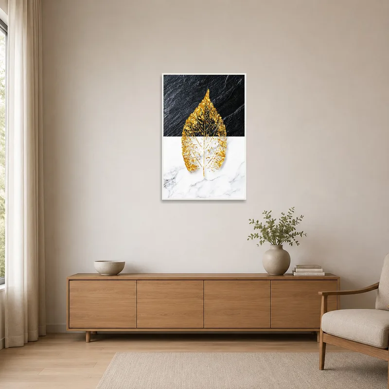 Gold-accented art hung on a plain wall, enhancing a minimalist space.